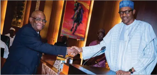  ??  ?? Onnoghen during Swearing-in by Buhari