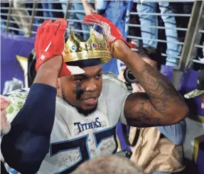  ?? GEOFF BURKE/USA TODAY SPORTS ?? Titans running back Derrick Henry celebrates with fans after the victory against the Ravens in an AFC divisional round game.