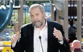  ?? Sean Kilpatrick/THE CANA DIAN PRESS ?? NDP leader Thomas Mulcair’s national child care program proposal is one of the party’s definitive ideas, unlike the Liberals, which have offered few.