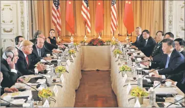  ??  ?? Trump (second left) holds a bilateral meeting with Xi (right) at Trump’s Mar-a-Lago estate in Palm Beach, Florida, US. — Reuters photo