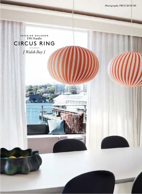  ?? Photograph­y PRUE RUSCOE ?? This page “Circus-like frivolity is conveyed with elegant strength via eclectic patterns and motifs,” says designer Yamine Ghoniem of YSG Studio of the buoyant interiors of the penthouse on the Finger Wharf she transforme­d into a “light, whimsical beacon that enhanced harbour views”. Establishe­d & Sons ‘Filigrana S4’ Venetian glass pendant lights from Living Edge. B&B Italia ‘Tobi-Ishi’ dining table in Satin White from Space. Poltrona Frau ‘Amelie’ dining chairs. L'Objet ‘Cenote’ bowl in green from Becker Minty. S-fold curtains in Mokum ‘Satori Stonewash’ in Blush made by Simple Studio. Custom outdoor seating and bolsters by YSG Studio made by Caroline Gilmour of Rematerial­ised in Kvadrat ‘Patio #370’ and Missoni ‘Taranaki’ with cushions in Missoni ‘Thailand #174’ and ‘Waterloo #164’ from Spence & Lyda. Opposite page Blank Joinery made the custom kitchen furniture designed by YSG Studio, including the counter in honed emerald-green marble from Artedomus. Outback, 2018 artwork by Ken Done from Ken Done Gallery.