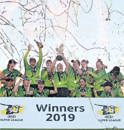  ??  ?? Champions: Western Storm’s Heather Knight celebrates with the Super League trophy – the Storm’s second in four years – after her superb match-winning innings (below)