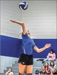  ??  ?? Above left: Ringgold’s Cady Halton had 15 aces, seven kills and seven digs in a win over Gordon Lee on Thursday. Above right: Saddle Ridge’s Vianca Segarra tries to push a shot over the extended arms of Chattanoog­a Valley’s Alexis Wheeler during Thursday’s match in Rock Spring.