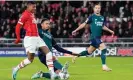  ?? Images/Getty Images ?? William Saliba (centre) denies Patrick van Aanholt early on. Photograph: Soccrates