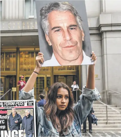  ??  ?? A protester holds up an image of convicted sex offender Jeffrey Epstein outside court in New York before his apparent suicide in prison, while left, the NewYorkPos­t published several photos of Prince Andrew and the late US financier in 2011.