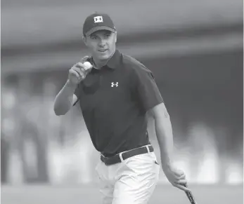  ?? AP PHOTO ?? Jordan Spieth reacts after his putt on the 16th hole during the first round at the Masters on Thursday.