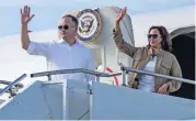  ?? (AFP) ?? US Vice President Kamala Harris and her husband Douglas Emhoff wave as they depart Puerto Princesa on Tuesday