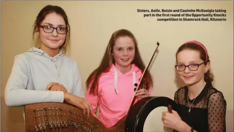  ??  ?? Sisters, Aoife, Roisin and Caoimhe McGonigle taking part in the first round of the Opportunit­y Knocks competitio­n in Shamrock Hall, Kilanerin