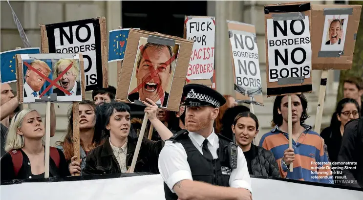  ??  ?? Protesters demonstrat­e outside Downing Street following the EU referendum result.