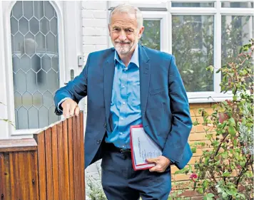  ??  ?? Jeremy Corbyn outside his north London home yesterday. He goes into the party conference this weekend after a bruising summer