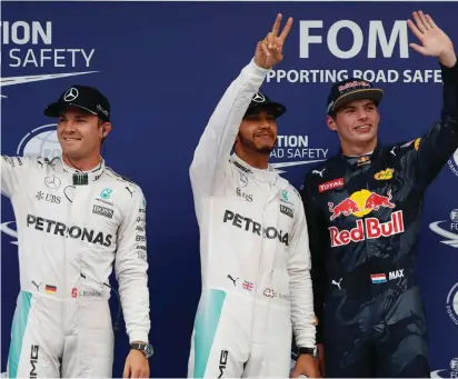  ??  ?? Lewis Hamilton (centre) together with Nico Rosberg and Max Verstappen