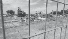  ??  ?? Only rubble remains of a family business that for decades created special memories on both sides of the border.