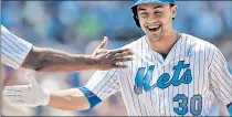  ?? Paul J. Bereswill ?? BACK ON TRACK: Michael Conforto, who missed three games with a bad back, celebrates after an RBI single.