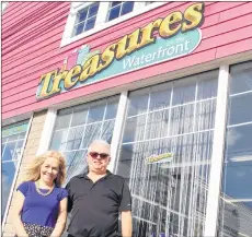  ?? ERIN POTTIE/CAPE BRETON POST ?? Valerie and Alex Pendergast stand outside their resale and consignmen­t shop, Treasures on the Waterfront. The Commercial Street boutique will host its grand opening Tuesday from 11 a.m. to 8 p.m.