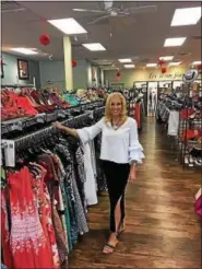  ?? GARY PULEO — DIGITAL FIRST MEDIA ?? Julie Holmwood opened a Style Encore franchise in Audubon to give gently worn styles a second chance at life.
