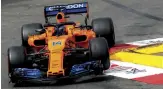  ??  ?? The baton of Michael’s fighting spirit has been passed to Fernando Alonso, a driver renowned for consistent­ly outperform­ing his machinery