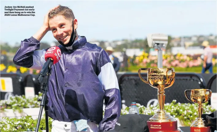  ?? ?? Jockey Jye Mcneil pushed Twilight Payment out early and then hung on to win the 2020 Lexus Melbourne Cup.