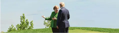  ?? Foto: Saul Loeb, afp ?? Wo soll’s hingehen? Bundeskanz­lerin Merkel und US Präsident Donald Trump auf dem G7 Gipfel.