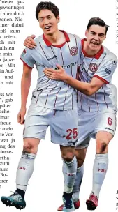  ?? FOTO: DPA ?? Jubel über den Auswärtssi­eg in Kaiserslau­tern: die Fortunen Genki Haraguchi (li.) und Florian Neuhaus.