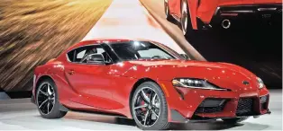  ?? DEREK MCNAUGHTON / DRIVING ?? The 2020 Toyota Supra, above, took inspiratio­n from the rare 2000 GT.
