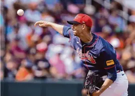  ?? Gerald Herbert/Associated Press ?? Atlanta Braves pitcher Charlie Morton throws in the fifth inning of a spring training baseball game against the Detroit Tigers on Tuesday in North Port, Fla.