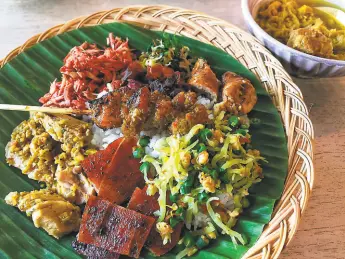  ?? ChiliCali ?? Balinese pork is served for a ChiliCali popup. It’s going to be a staple dish at Warung Siska, a new Indonesian restaurant that opened in Redwood City on Wednesdsay.