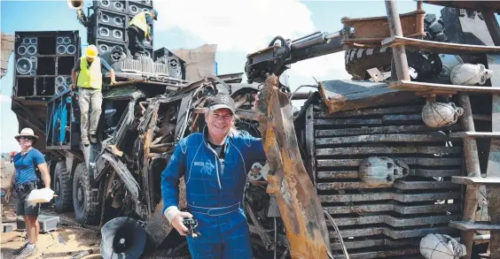  ??  ?? Gold Coaster Guy Norris on the set of Mad Max: Fury Road: He has been invited to join ‘the Oscars club’ – the Academy of Motion Picture Arts and Sciences.