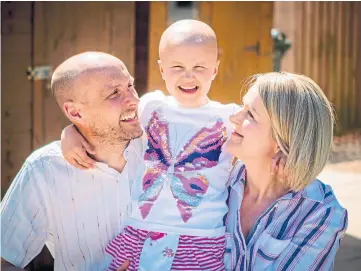  ??  ?? TRAGIC: Ruby with her mum and dad, Claire and Andy. Picture by Steve Macdougall.