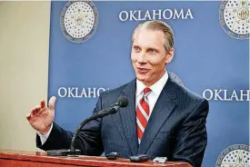  ?? [PHOTO BY TODD FRASER, THE OKLAHOMAN
ARCHIVES] ?? Oklahoma Treasurer Ken Miller speaks to reporters in April.