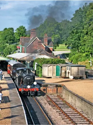  ?? JON BOWERS ?? A vision worth protecting:
A tranquil scene at the south end of the Horsted Keynes station in August 2005 as two Brighton-built engines – BR ‘4MT’ 2-6-4T No. 80151 and LBSCR ‘E4’ 0-6-2T No. 32473 (Birch Grove ) are prepared to return to Sheffield Park.