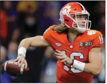  ?? (AP file photo) ?? College athletes such as Clemson quarterbac­k Trevor Lawrence would be able to earn money from endorsemen­ts and sponsorshi­p deals through a set of proposals that will go up for a vote in January.