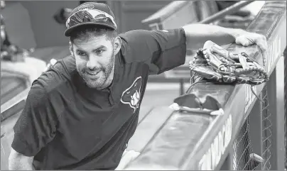  ?? AP PHOTO ?? In this Oct. 2, 2017, file photo, Arizona Diamondbac­ks’ J.D. Martinez smiles as he talks with another player during practice at Chase Field in Phoenix.