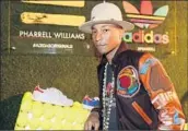  ?? Christophe­r Polk
Getty Images for Adidas ?? PHARRELL WILLIAMS at a Dec. 3 party in Los Angeles marking the collaborat­ion with Adidas.