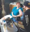  ?? John Frank, The Denver Post ?? Colorado Lt. Governor Donna Lynne, a Democratic candidate for governor, gets a tattoo on her arm from artist Matt Schiel on Wednesday while filming an ad at Old Larimer Street Tattoo in Denver.