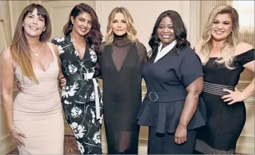  ?? Rob Latour Variety ?? GATHERED at Power of Women luncheon at Beverly Wilshire Hotel are the honorees: director Patty Jenkins, left, actresses Priyanka Chopra, Michelle Pfeiffer and Octavia Spencer and singer-songwriter Kelly Clarkson.