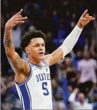  ?? Marcio Jose Sanchez / Associated Press ?? Duke forward Paolo Banchero celebrates during the first half against Arkansas in the Elite 8 round of the NCAA Tournament in San Francisco on March 26. Orlando landed the No. 1 pick in the NBA draft on Tuesday night.
