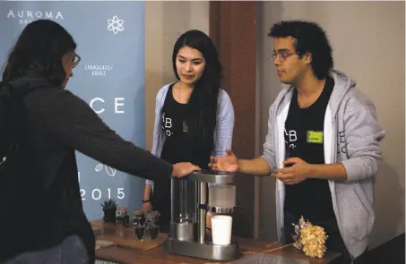  ?? Photos by Franchon Smith / The Chronicle ?? Auroma Brewing co-founders Ornicha Srimokla (left) and Rayan Alshaibani discuss their coffee maker that personaliz­es brews.