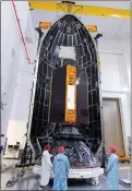  ?? ESA — STEPHANE CORVAJA ?? In this Nov. 3 provide by the European Space Agency, the Sentinel-6 satellite is placed inside the upper stage of a Falcon 9 rocket.