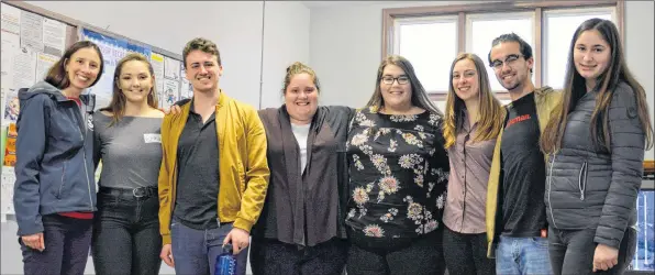  ?? COLIN CHISHOLM ?? Acadia University lecturer Mary Sweatman, pictured far left, poses alongside some of her students from the school’s Community Developmen­t program.
