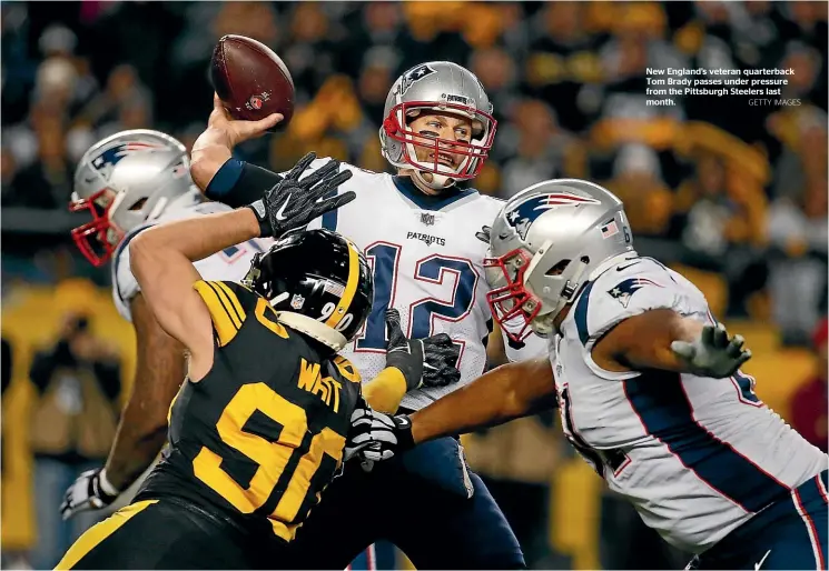  ?? GETTY IMAGES ?? New England’s veteran quarterbac­k Tom Brady passes under pressure from the Pittsburgh Steelers last month.