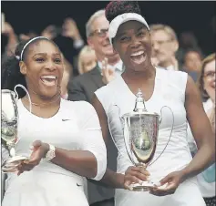  ??  ?? File photo shows Serena and Venus celebrate after winning their 2016 Wimbledon women’s doubles final. — Reuters photo
