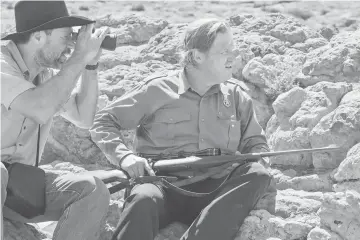  ??  ?? Kevin Wiggins, left, and Jeff Bridges in ‘Hell or High Water’, the story of a soon-to-retire Texas ranger (Bridges) pursuing two bank robber brothers. — Photo courtesy of Lorey Sebastian, CBS Films.