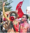  ?? REUTERS ?? Demonstrat­ors protest in front of the Chinese embassy against the military coup and to demand for the release of elected leader Aung San Suu Kyi, in Yangon, Myanmar, on Friday.