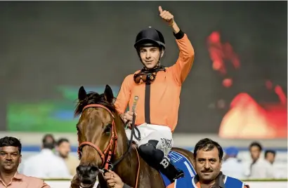  ?? — Photo by Neeraj Murali ?? Jockey Bernardo Pinheiro celebrates after guiding Dubawi’s Thunder to victory at Meydan on Thursday.