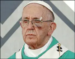  ??  ?? Pope Francis shows a bruise around his left eye caused by an accidental hit against the popemobile’s window glass while visiting Cartagena in Colombia on Sunday. REUTERS