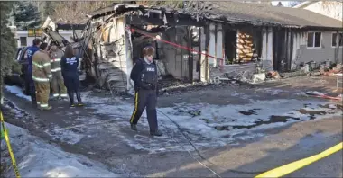  ?? RON SEYMOUR/Courier Extra ?? One person was killed in a house fire on Springfiel­d Road in Kelowna last week.