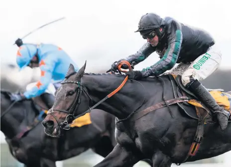  ??  ?? ■ Altior ridden by Nico De Boinvile on the run up to the finish to win The Betfair Tingle Creek Chase during day two of the Betfair Tingle Creek Christmas Festival at Sundown Park Racecourse