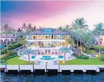  ??  ?? The house, on Tahiti Beach Island Road, is in the exclusive Tahiti Beach neighborho­od of Cocoplum, a gated community close to downtown Coral Gables.