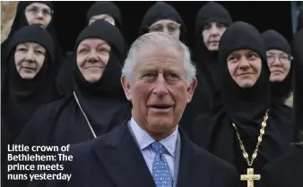  ??  ?? Little crown of Bethlehem: The prince meets nuns yesterday