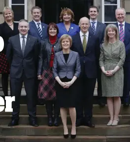  ??  ?? ‘EQUALITY’: Nicola Sturgeon unveils her gender-neutral Cabinet in 2014